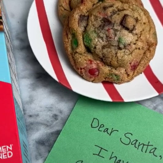 Santa's Midnight Munchie Cookies on a plate next to a letter for Santa.