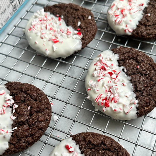 Double chocolate chip cookies dipped in white chocolate with peppermint topping.